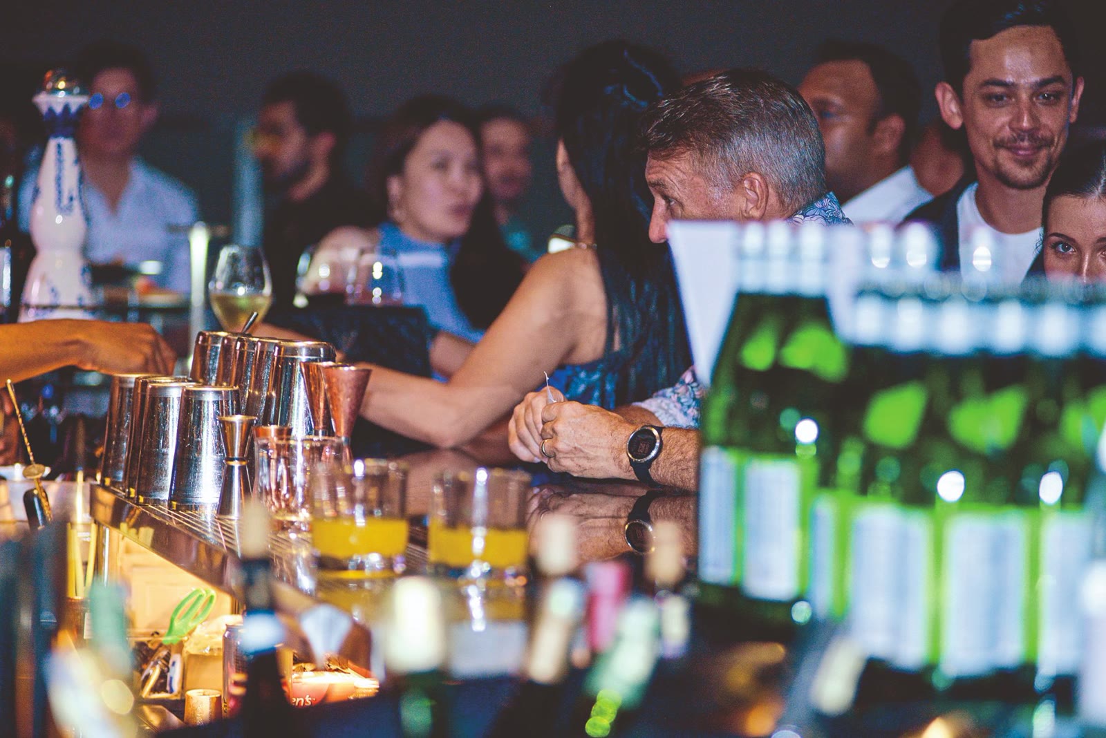 Guests at the bar at Mingle Plus