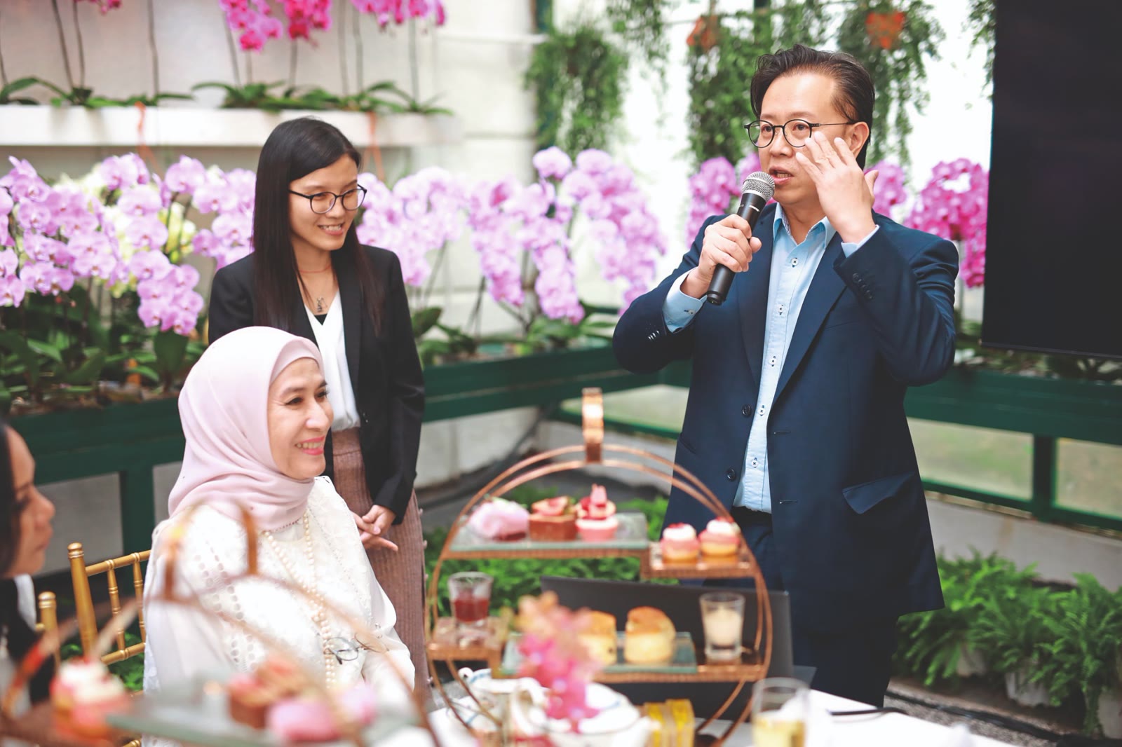 A speaker at an afternoon tea organised for Prince Court Medical Centre